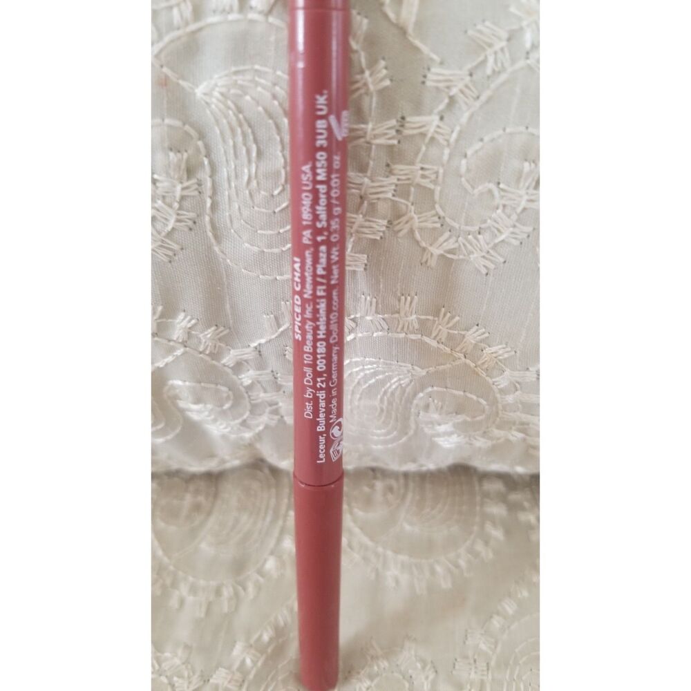 The Doll 10 Peptide Plumping Lip Liner in Spiced Chai.